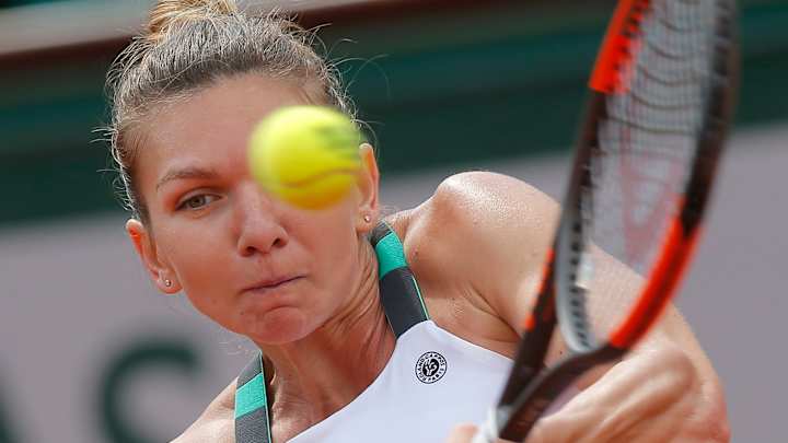 The Latest: Halep advances to French Open quarterfinals