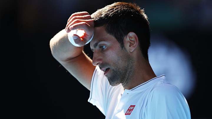 Six-time champ Novak Djokovic stunned by qualifier Denis Istomin at Australian Open