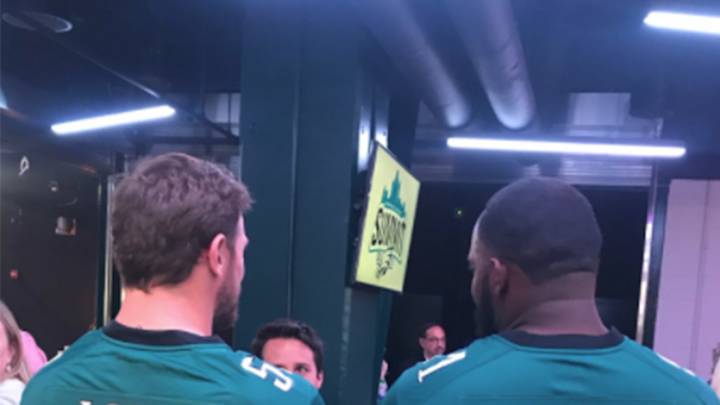 Immature sports fans will laugh when they see these Eagles stand next to each other
