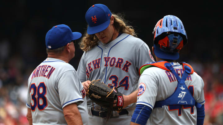 Noah Syndergaard exits start in second inning with possible lat strain Noah Syndergaard exits start in second inning with possible lat strain