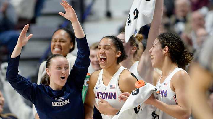 UConn's former walk-on Lawlor shooting for her fourth title