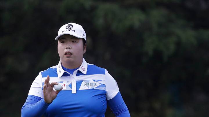 Feng takes 1-stroke lead after bogey-free 66 in Michigan