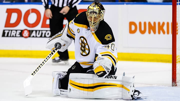 Bruins goalie Tuukka Rask leaves after taking puck near jaw