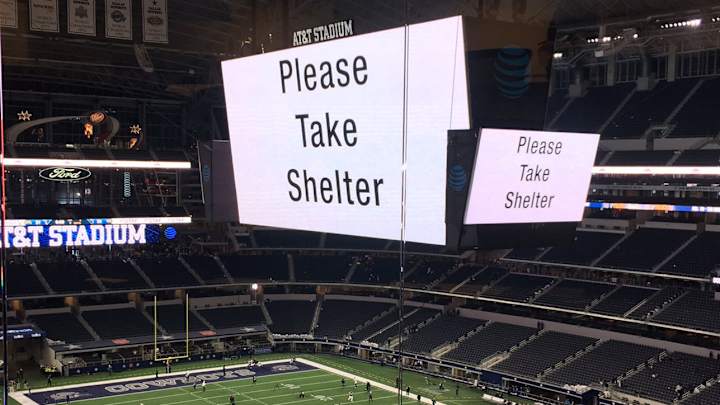 Players, fans told to take shelter in AT&T Stadium during tornado, flood warning