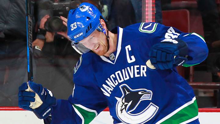 Canucks' Henrik Sedin notches 1,000th NHL point with goal vs. Panthers