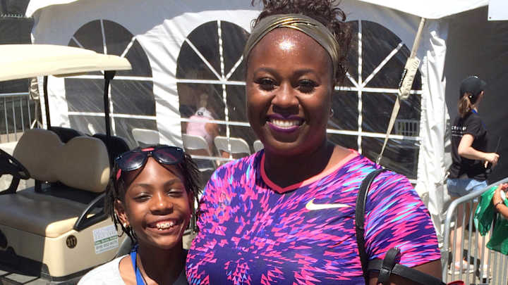 Once-homeless sisters mingle with track stars at nationals