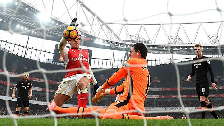 Sanchez double sees Arsenal beat Hull amid controversy