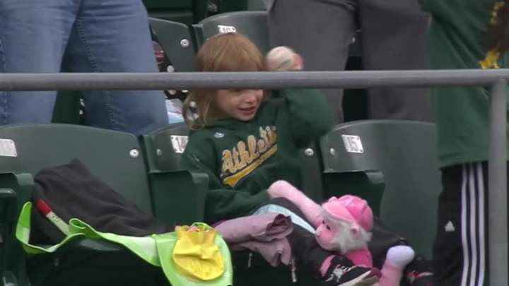 Video: Child gleefully throws away souvenir ball, dad has to scramble to get it back