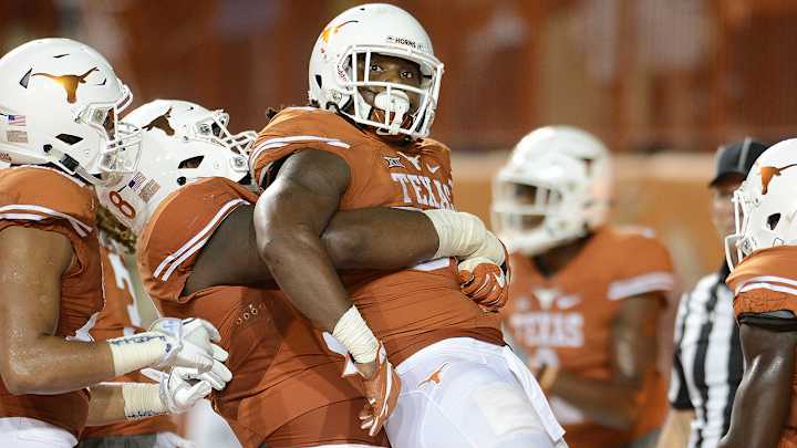 D'Onta Foreman shows up at combine lighter and ready to run with the draft's top backs