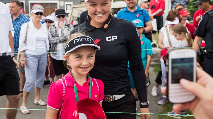 Sharp pulls into tie for 2nd round lead at Cambridge