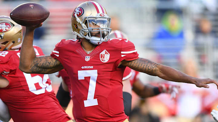 Ravens coach John Harbaugh defends Colin Kaepernick