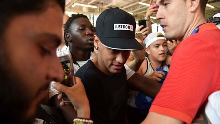 PHOTOS: Images Emerge Online of Neymar Embroiled in Angry Bust Up With Barca Supporters