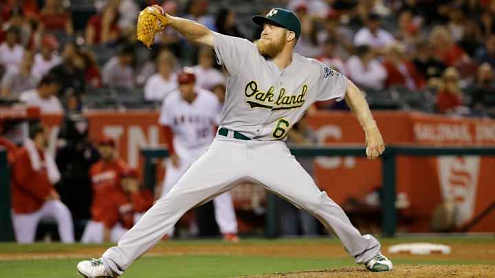 A’s Sean Doolittle plays imaginary baseball with young fan