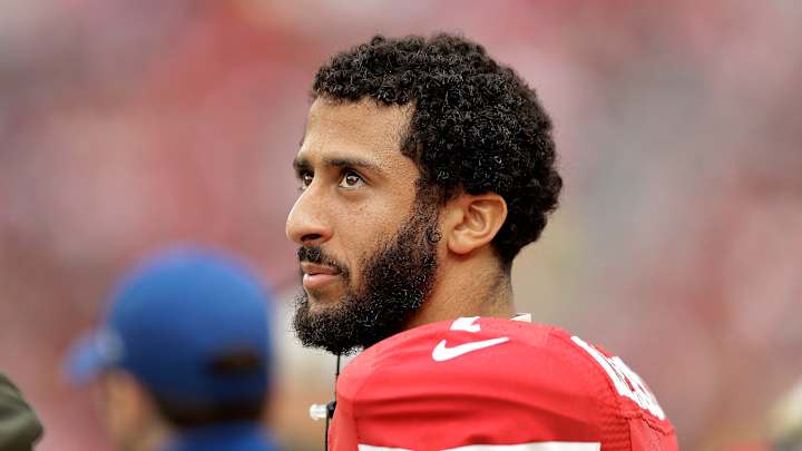 AP Source: Kaepernick meets with Elway