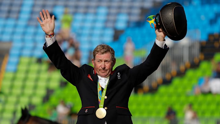 Skelton wins Britain's 1st gold in individual jumping at 58