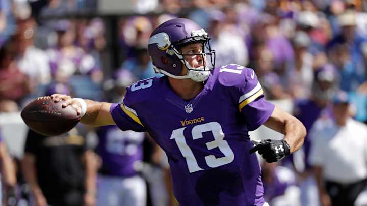 Vikings beat Titans 26-15, must decide who starts at QB next