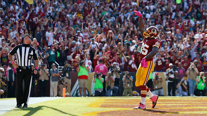 Giants' Beckham fined $24K for taking helmet off after TD