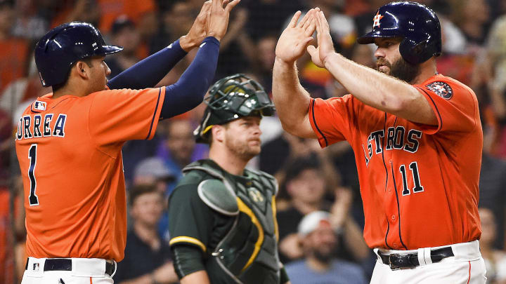 Gattis, big 1st inning propel Astros to 12-2 win over A's