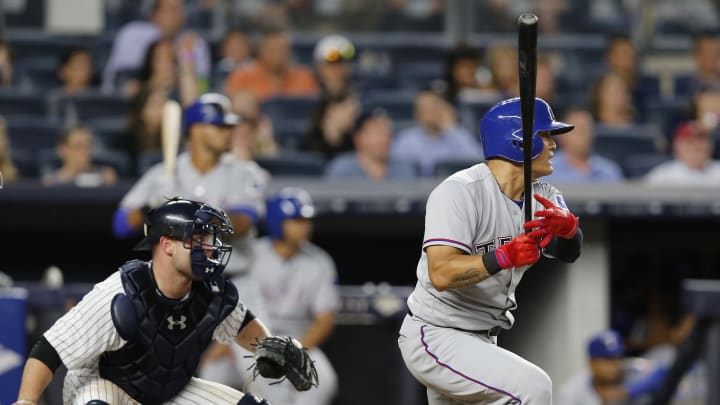 Rangers-Yankees game delayed in 9th by rain, teams wait