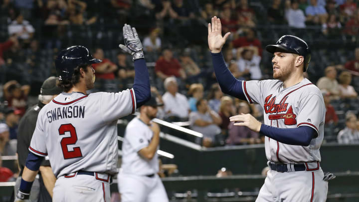 Kemp's bases-loaded double lifts Braves past D-backs