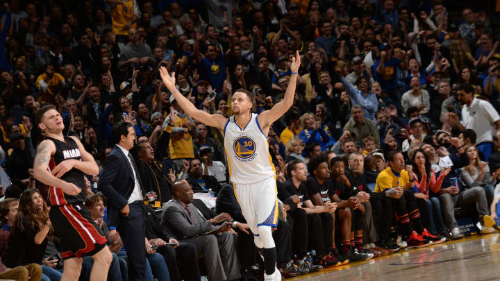 Warriors beat Heat 111-103 for 36th straight home win