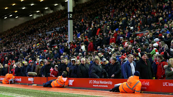 Liverpool fans stage walkout over ticket prices