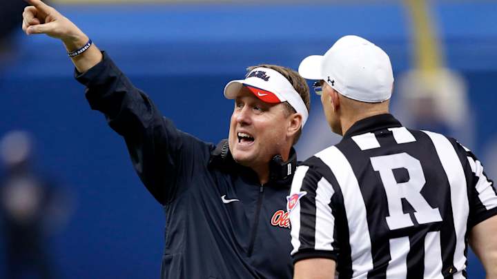 AP Source: Ole Miss football cited in 13 of 28 violations