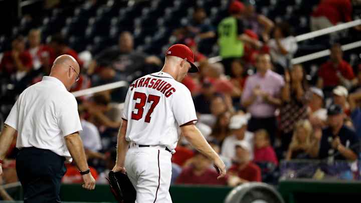 Strasburg feels pinch in elbow, Nats beat Braves in 11th Strasburg feels pinch in elbow, Nats beat Braves in 11th