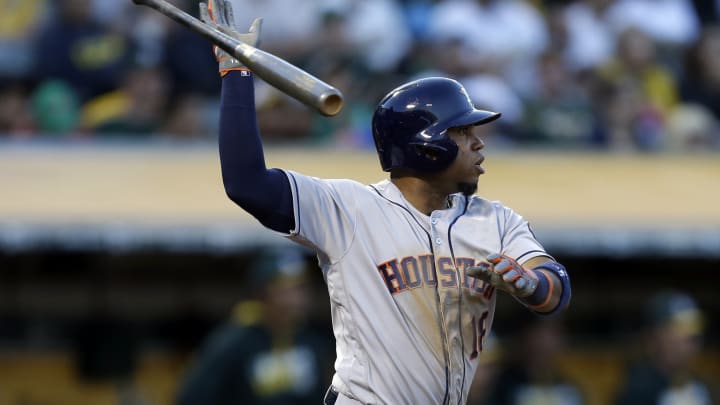 Athletics rally from 3 down to beat Astros 4-3 in 10