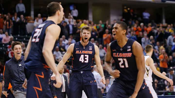 Illinois holds on for stunning 68-66 upset of No. 20 Iowa