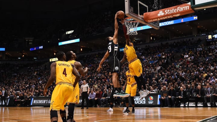 Watch: Malcolm Brogdon puts LeBron James and Kyrie Irving on a poster