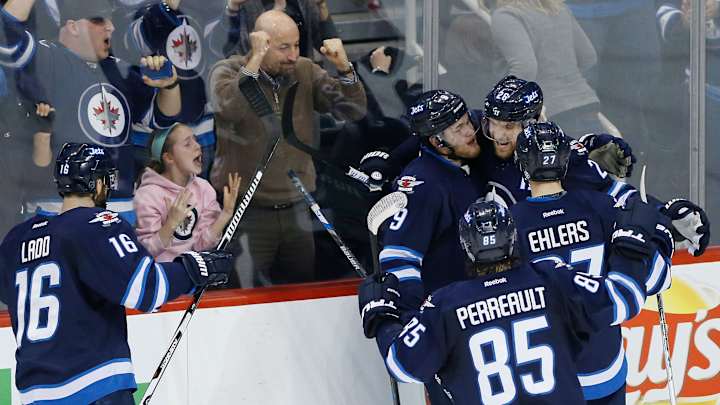 Wheeler scores early in OT and Jets beat Predators 5-4