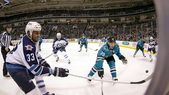 Hellebuyck makes 27 saves and Jets beat Sharks 4-1 Hellebuyck makes 27 saves and Jets beat Sharks 4-1