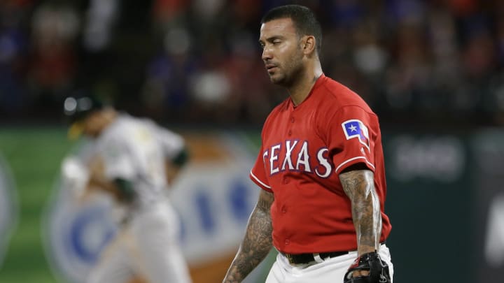 Davis homers twice, Crisp goes deep as A's beat Rangers 6-4