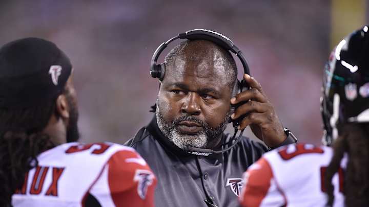 Falcons coach Bryan Cox to apologize for pushing Cardinals scout