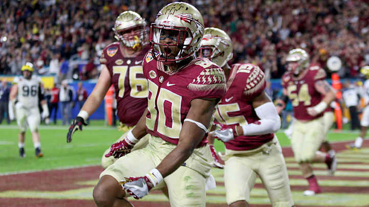 Florida State outlasts Michigan to prevail in Orange Bowl for the ages Florida State outlasts Michigan to prevail in Orange Bowl for the ages