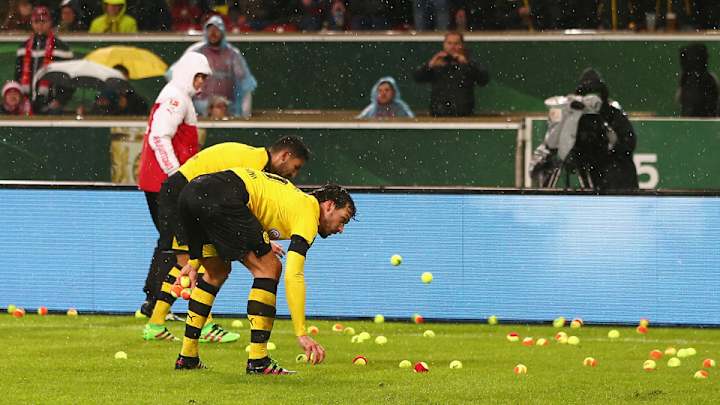 Watch: Dortmund fans throw tennis balls in protest Watch: Dortmund fans throw tennis balls in protest