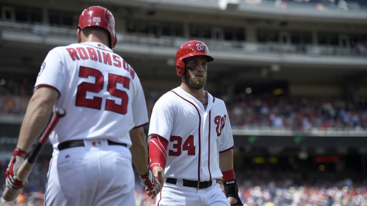 Harper doubles in return, Roark pitches Nats past Braves