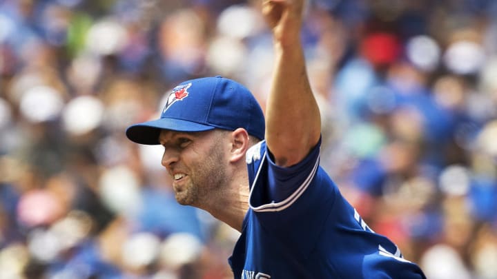 Happ gets career-high 13th win, Blue Jays beat Mariners 2-0