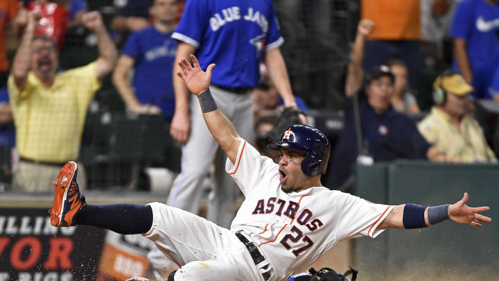 Correa's RBI double in 14th lifts Astros past Blue Jays