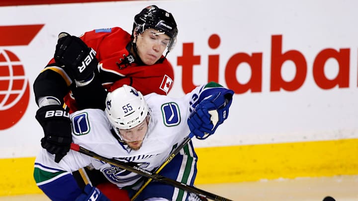 Brodie stays hot with 3 assists, Flames beat Canucks 5-2