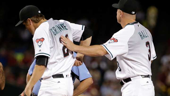 Greinke leaves early with injury, Phillies rally for 4-3 win