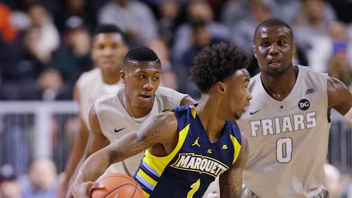 Marquette beats No. 8 Providence 65-64