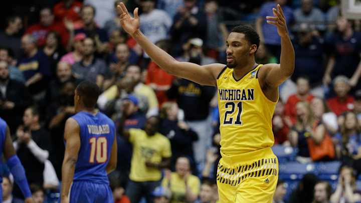 Michigan wins on another late shot, beating Tulsa 67-62