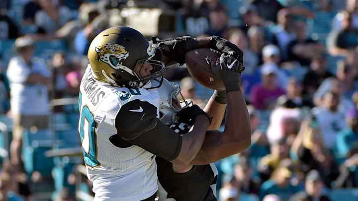 Jaguars place TE Thomas, DE Odrick on injured reserve Jaguars place TE Thomas, DE Odrick on injured reserve