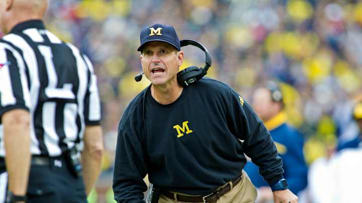 Harbaugh blasts NCAA for barring out-of-area football camps Harbaugh blasts NCAA for barring out-of-area football camps