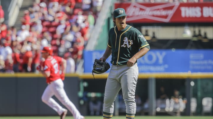Bruce's 2-run homer sends Reds over slumping Athletics 2-1