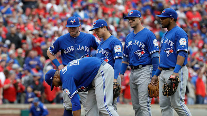 Jays lefty Liriano leaves after taking line drive off neck