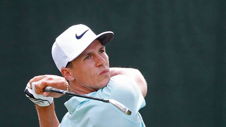 Denmark holds off challenge to win golf's World Cup
