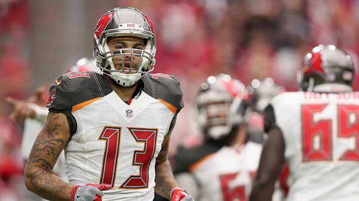Mike Evans sits during national anthem to protest Donald Trump’s victory